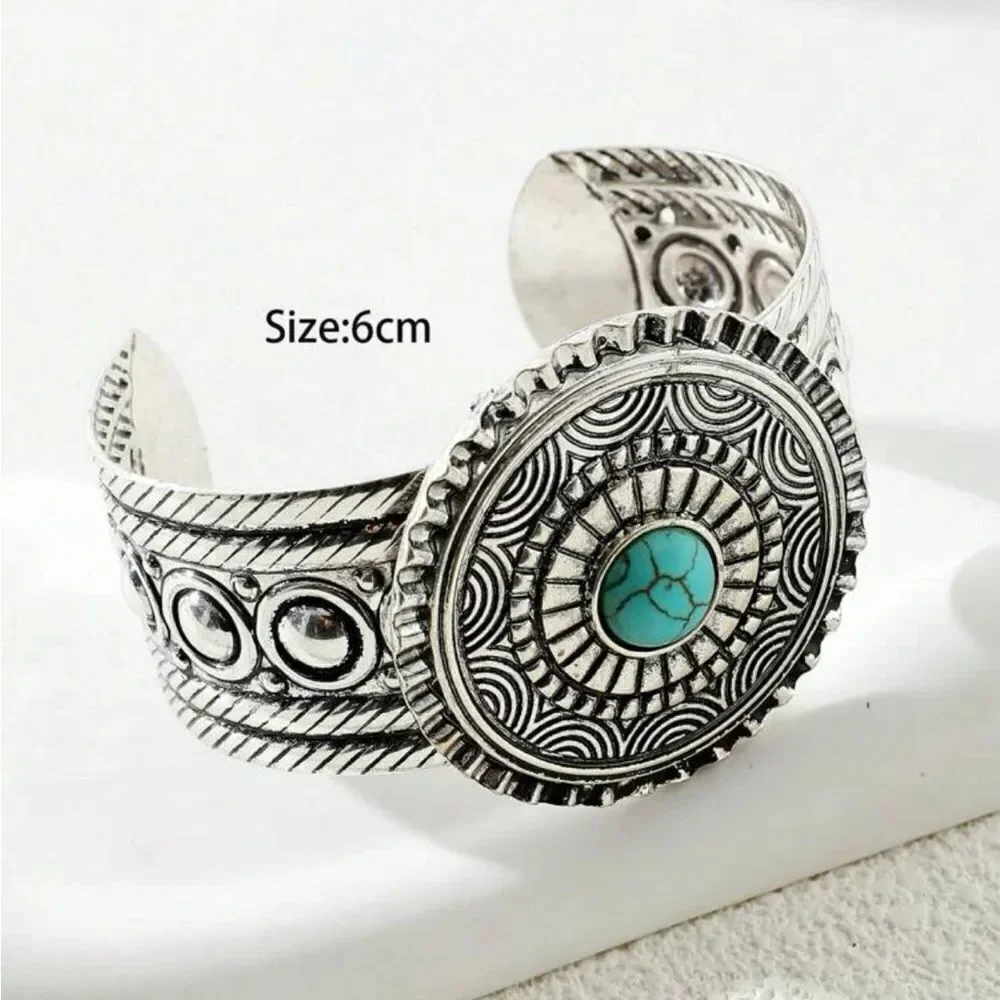 Beautiful intricate design silver cuff bracelet with turquoise stone center! New